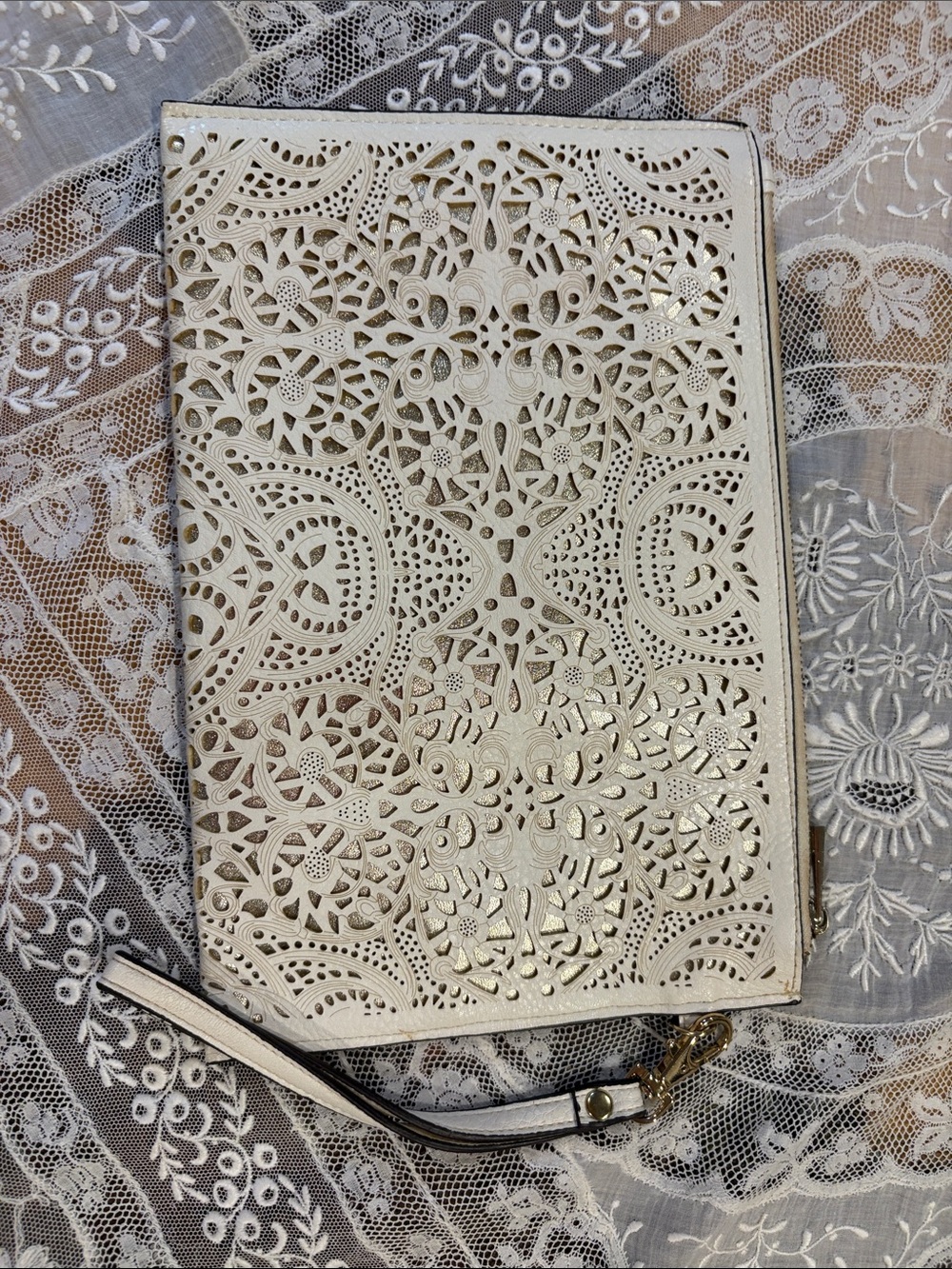 Call It Spring Ivory Laser-Cut Wristlet Clutch with Gold Hardware